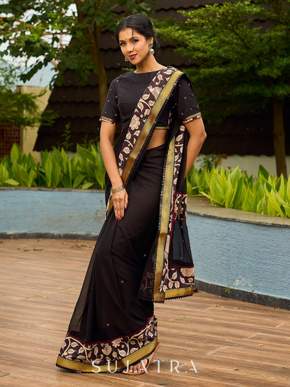 Vibrant Black Georgette Saree with Golden Zari Border & Kalamkari Floral Print Pallu & Border