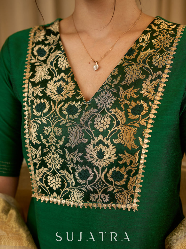 A traditional look featuring a red Cotton silk lehenga with a green Cotton silk choli with brocade yoke  - Contrast dupatta optional