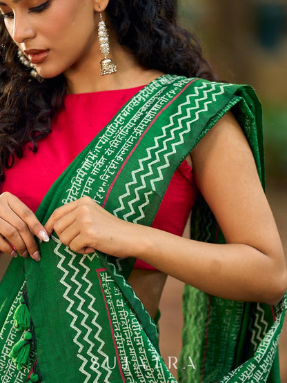 Refined Green Cotton Saree with Hand Block Printed Slogan Border & Contrasting Pink Accents