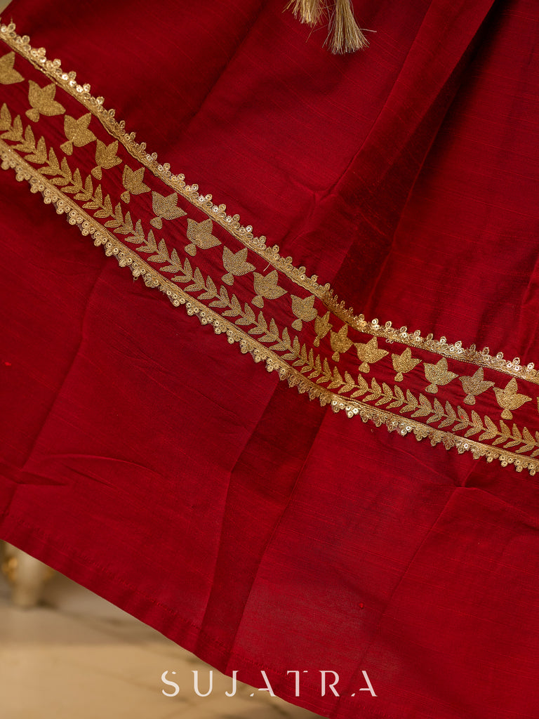 A traditional look featuring a red Cotton silk lehenga with a green Cotton silk choli with brocade yoke  - Contrast dupatta optional