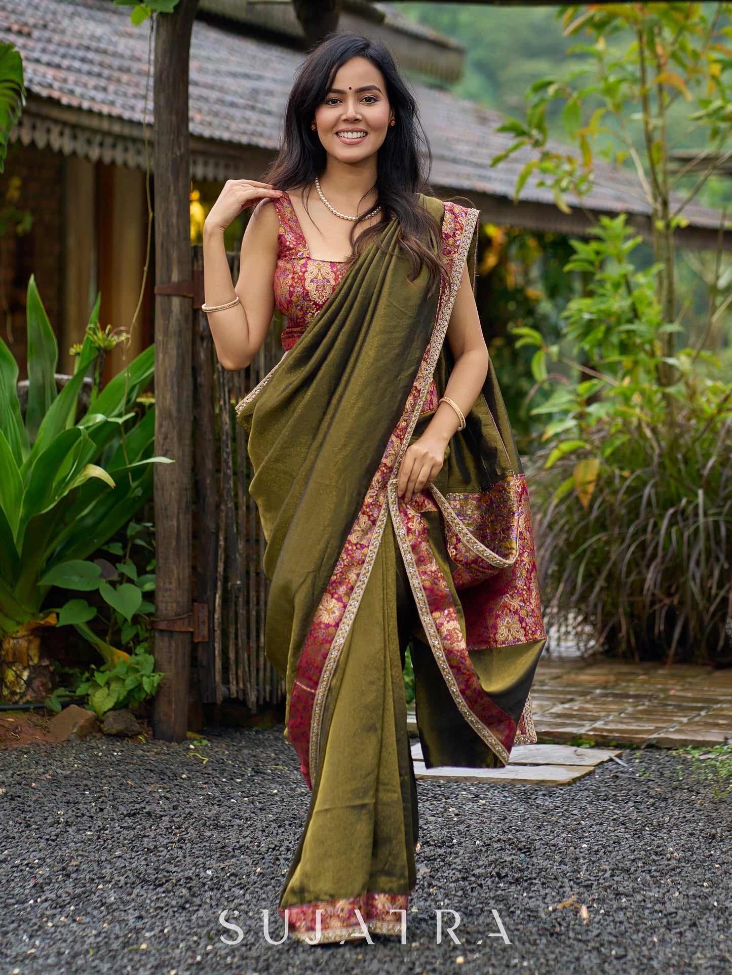 Regal olive tissue saree enhanced by intricate Banarasi brocade border
