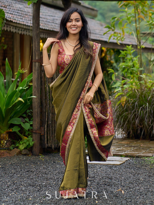 Regal olive tissue saree enhanced by intricate Banarasi brocade border