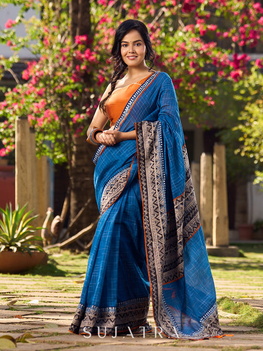 Elegant Blue Saree with Geometric Kalamkari Border and Contrasting Orange Accents