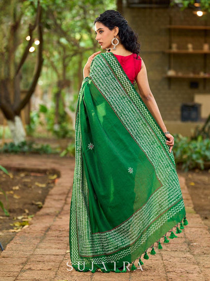 Refined Green Cotton Saree with Hand Block Printed Slogan Border & Contrasting Pink Accents