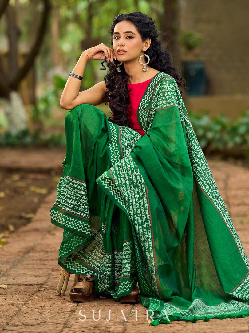 Refined Green Cotton Saree with Hand Block Printed Slogan Border & Contrasting Pink Accents
