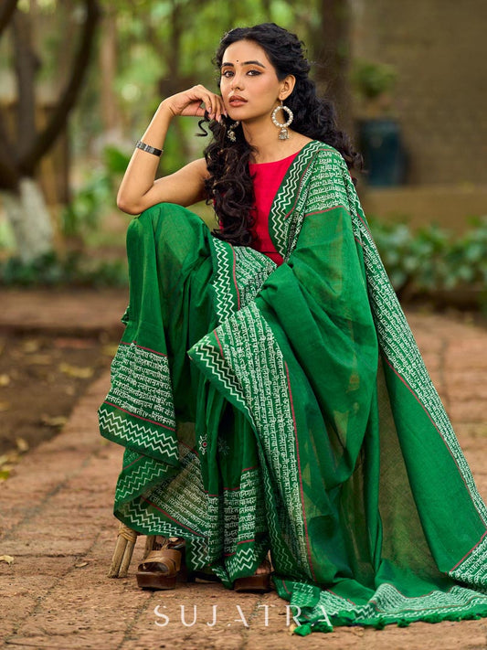 Refined Green Cotton Saree with Hand Block Printed Slogan Border & Contrasting Pink Accents