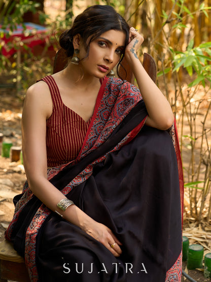 Noir Grace : Exclusive Modal Silk Saree with Red Ajrakh Border