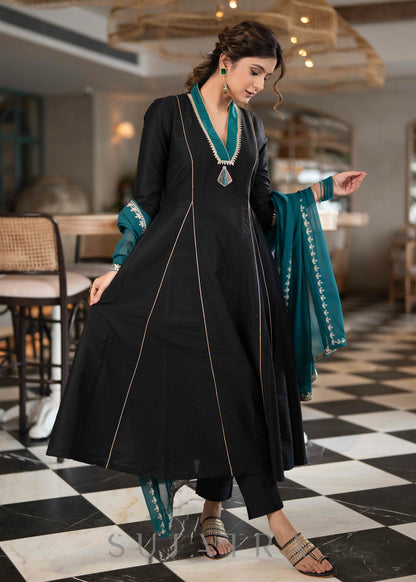 Beautiful A Line Kurta With Turquoise Detailing highlighted with Brooch