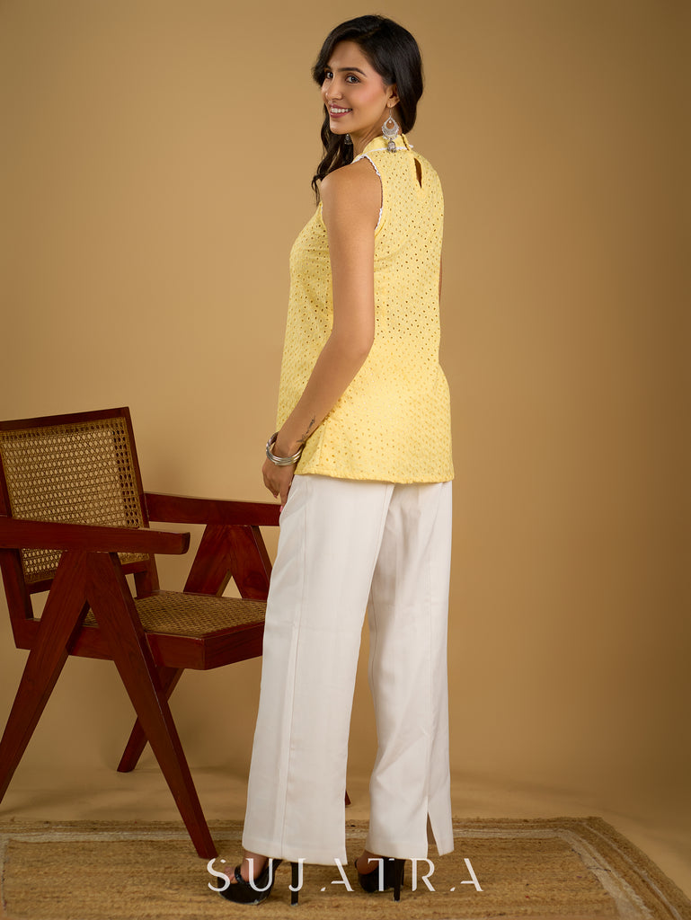 Stylish halter neck top crafted in soft yellow hakoba .