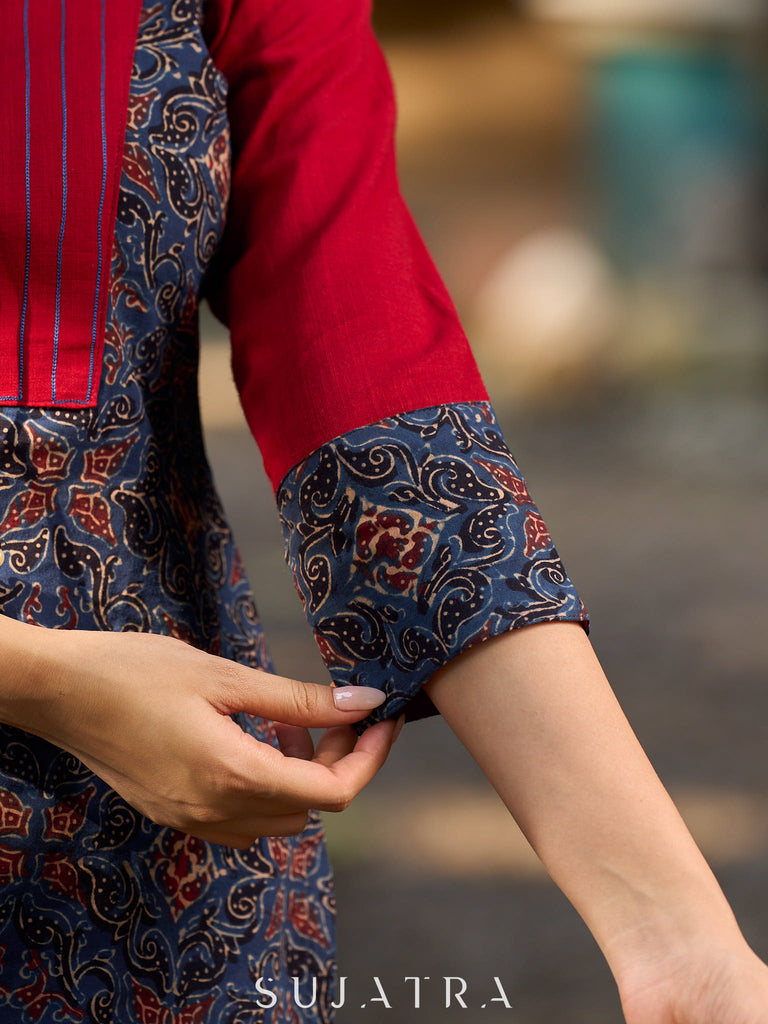 Blue Ajrakh short kurta with a handcrafted maroon patch.