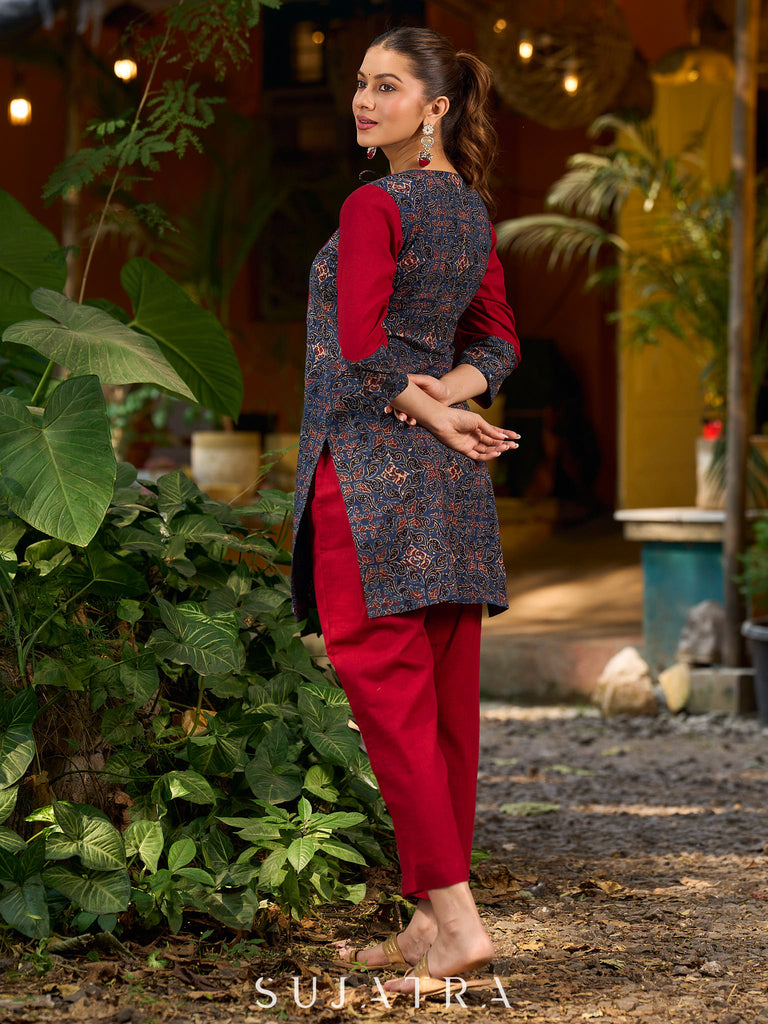 Blue Ajrakh short kurta with a handcrafted maroon patch.