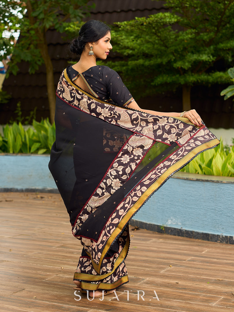 Vibrant Black Georgette Saree with Golden Zari Border & Kalamkari Floral Print Pallu & Border
