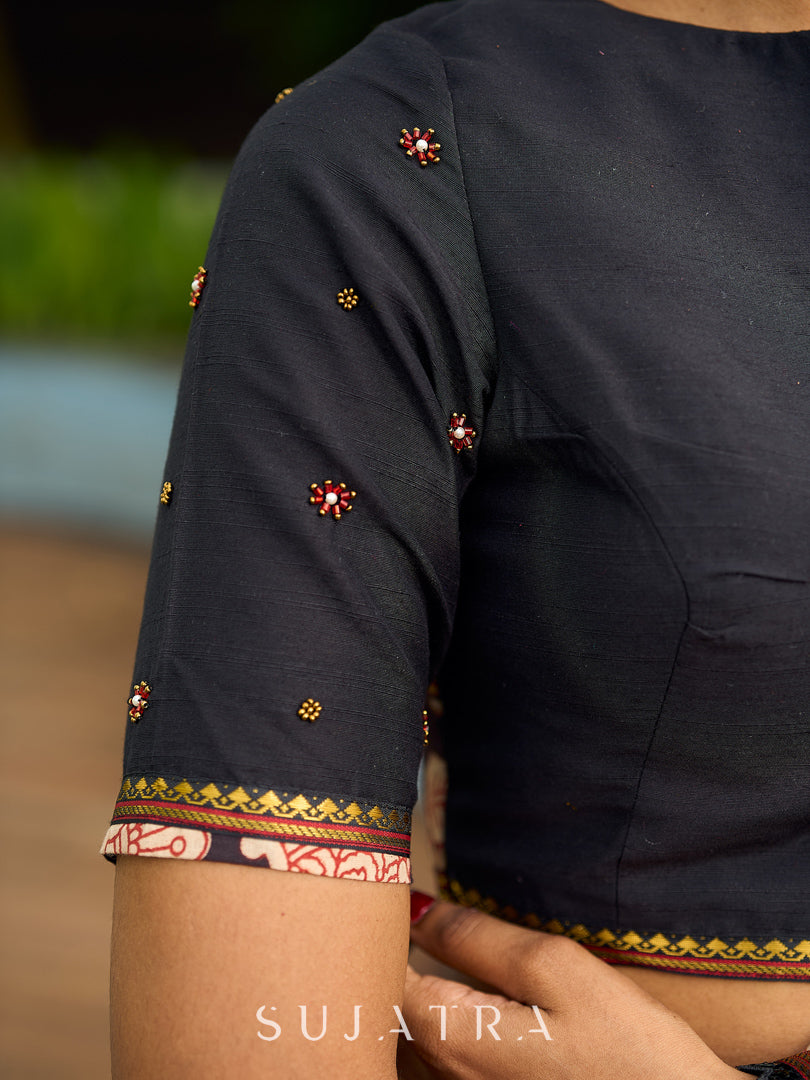 Vibrant Black Georgette Saree with Golden Zari Border & Kalamkari Floral Print Pallu & Border