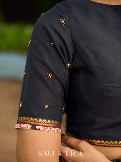 Vibrant Black Georgette Saree with Golden Zari Border & Kalamkari Floral Print Pallu & Border