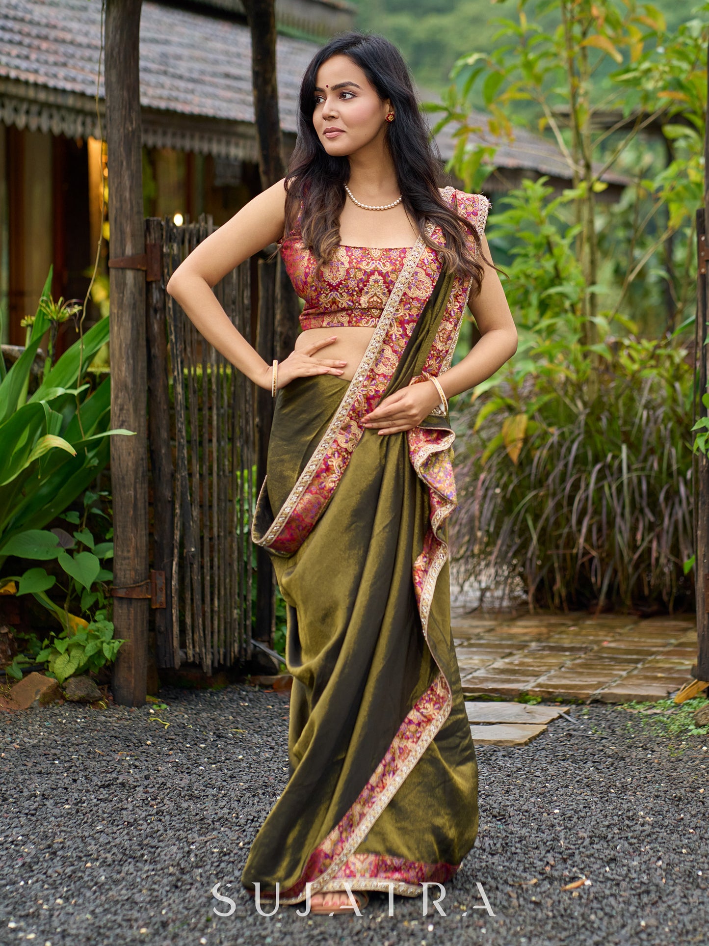 Regal olive tissue saree enhanced by intricate Banarasi brocade border