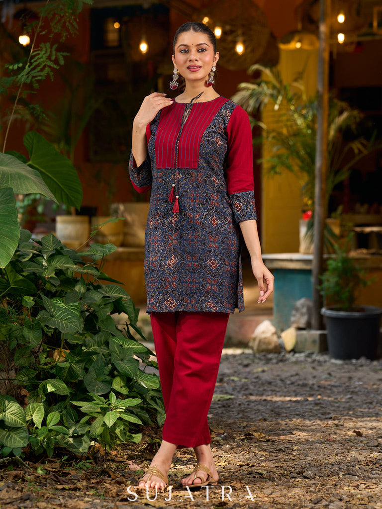 Blue Ajrakh short kurta with a handcrafted maroon patch.