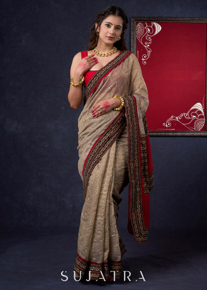 Lustrous Chanderi Grey Saree with Self Gold Checks Highlighted with Ajrakh Border & Palu with Maroon Detailing