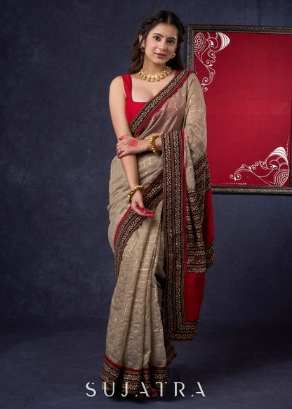 Lustrous Chanderi Grey Saree with Self Gold Checks Highlighted with Ajrakh Border & Palu with Maroon Detailing