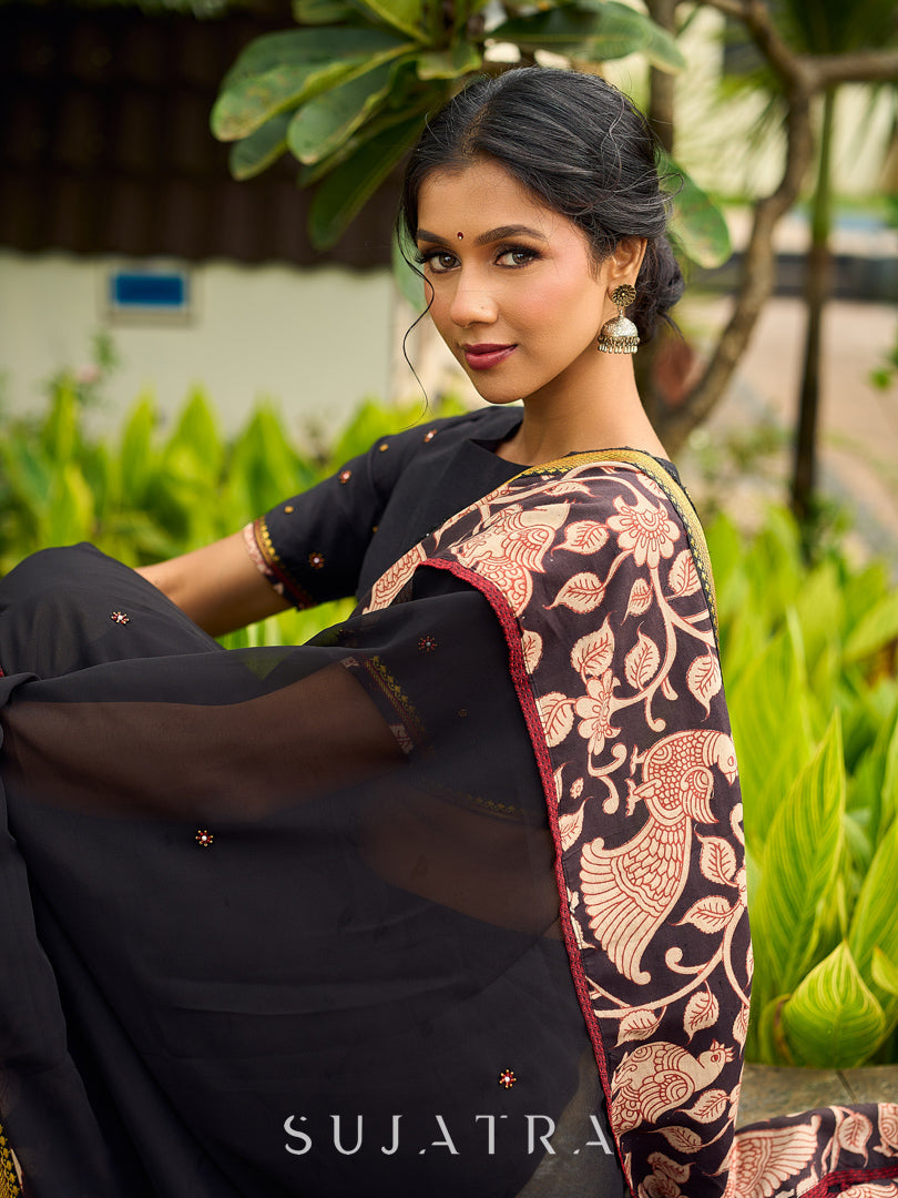 Vibrant Black Georgette Saree with Golden Zari Border & Kalamkari Floral Print Pallu & Border