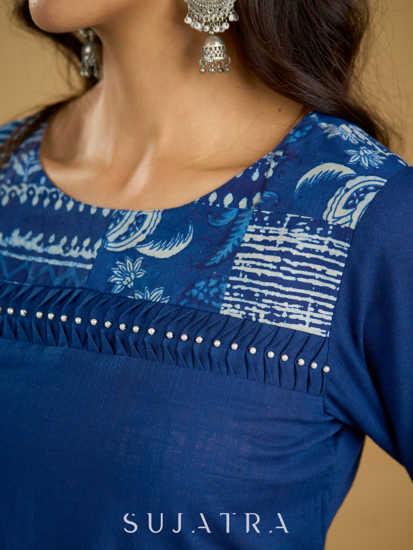 Classic indigo cotton patchwork top with  subtle pearl highlights