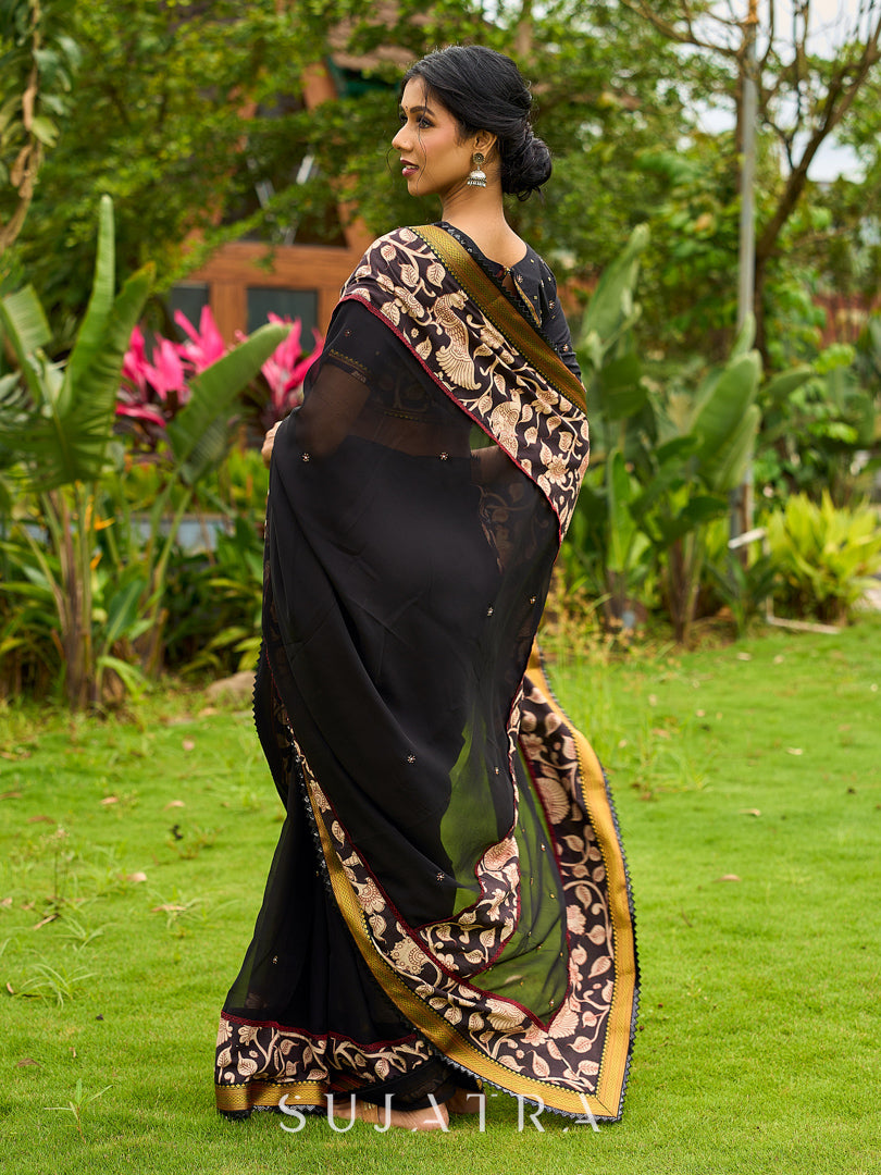 Vibrant Black Georgette Saree with Golden Zari Border & Kalamkari Floral Print Pallu & Border