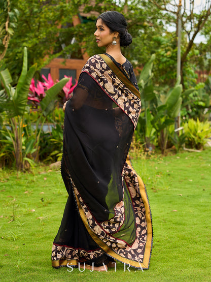 Vibrant Black Georgette Saree with Golden Zari Border & Kalamkari Floral Print Pallu & Border