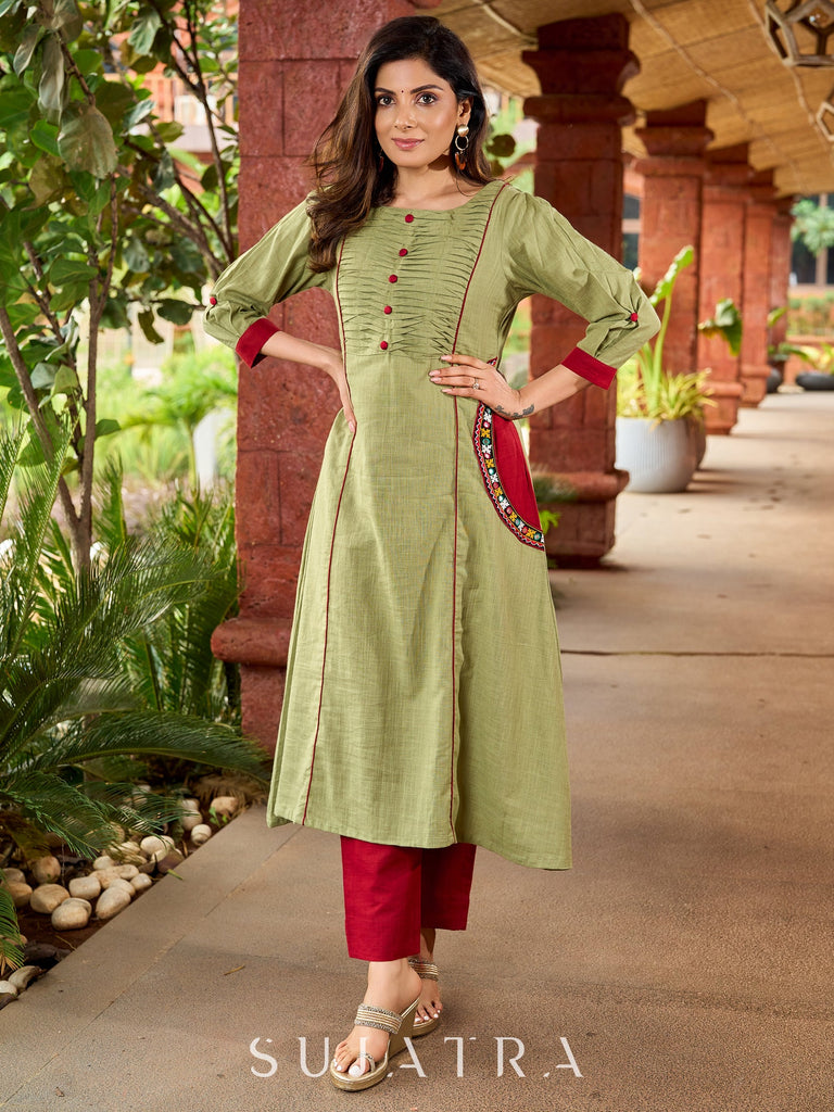 Beautiful Pista green cotton kurta featuring mirror-highlighted functional side pocket -pant optional