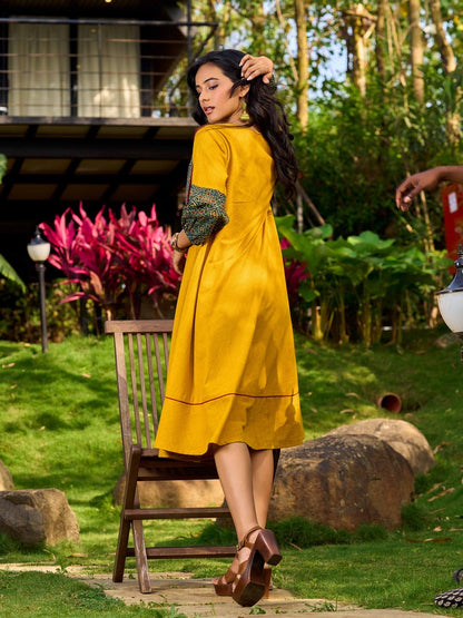 Handcrafted Mustard Cotton Flared Dress with Contrasting Ajrakh Collar