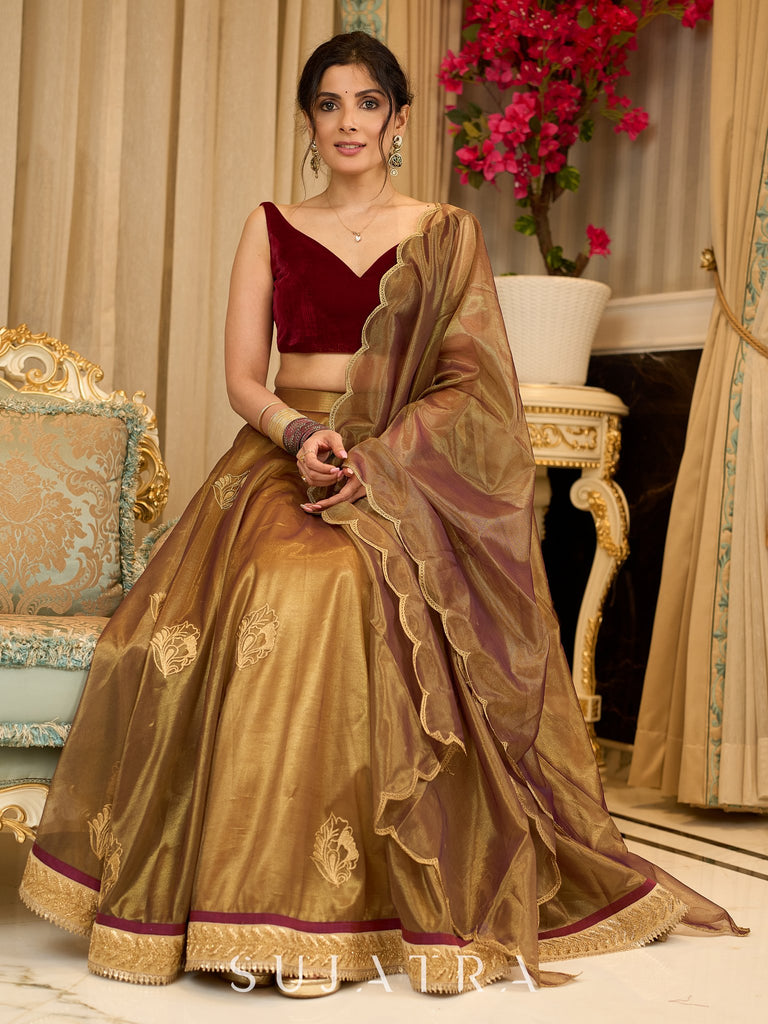 Regal ensemble gold tissue lehenga with intricate embroidery and a stunning velvet blouse  - Dupatta Optional