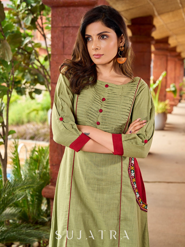 Beautiful Pista green cotton kurta featuring mirror-highlighted functional side pocket -pant optional