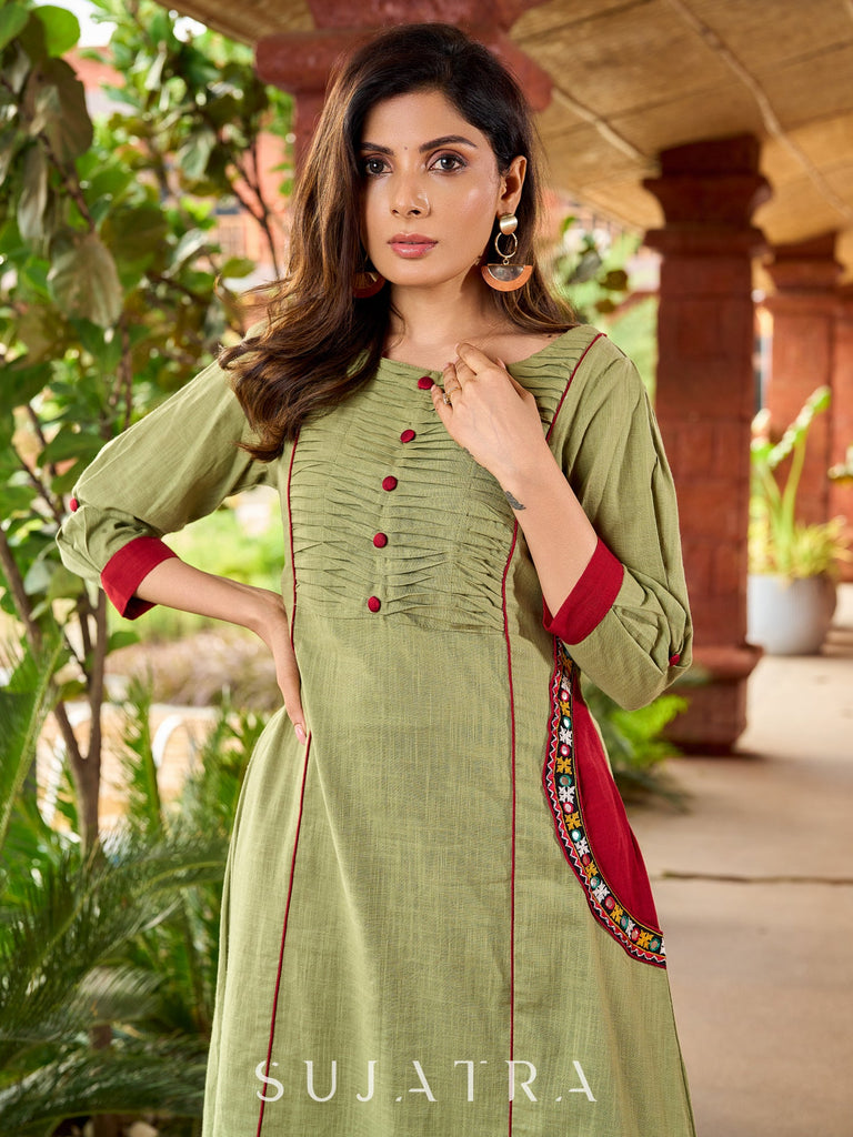 Beautiful Pista green cotton kurta featuring mirror-highlighted functional side pocket -pant optional