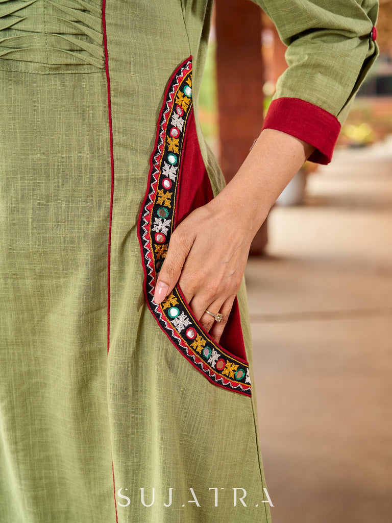 Beautiful Pista green cotton kurta featuring mirror-highlighted functional side pocket -pant optional