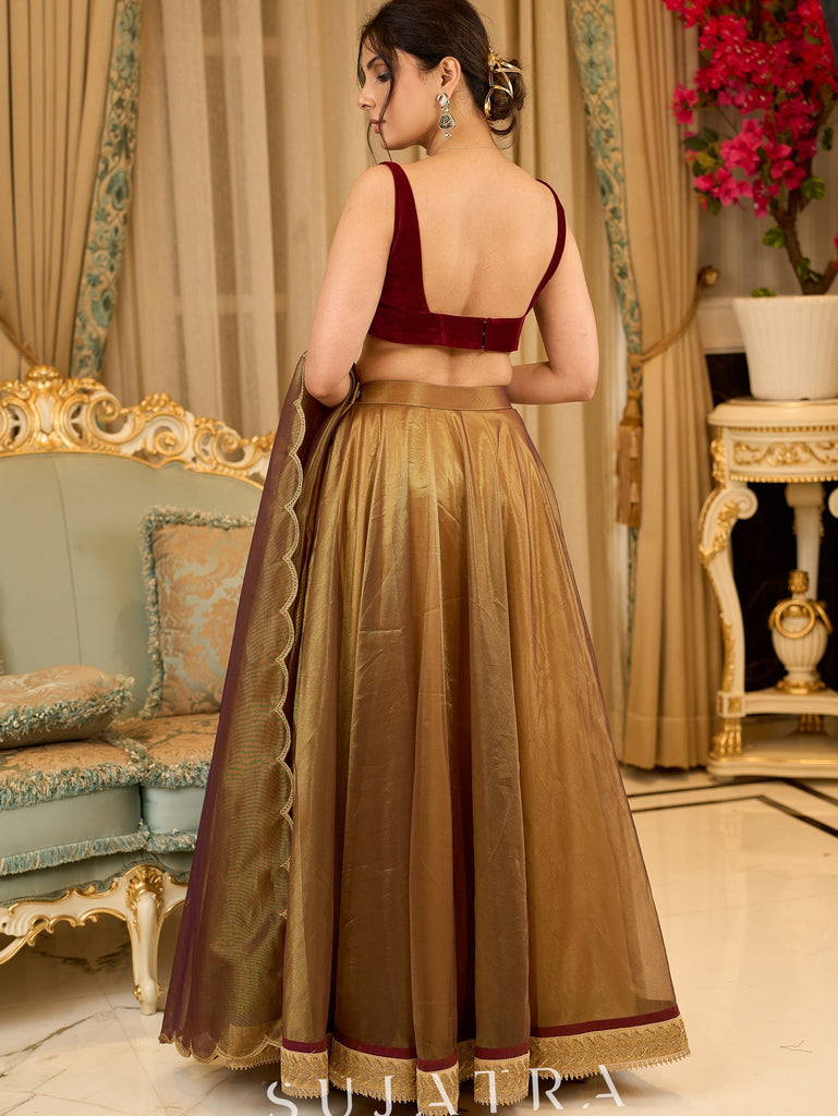 Regal ensemble gold tissue lehenga with intricate embroidery and a stunning velvet blouse  - Dupatta Optional