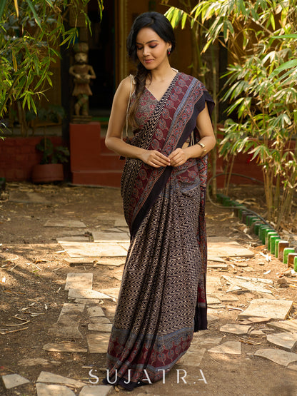 Black Hand Block Printed Ajrakh Modal Saree with Zigzag Pattern and Ornate Border