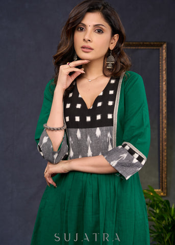 Elegant-Bottle-Green-Cotton-A-Line-Kurta-Highlighted-With-Ikat-Combination--Pant-Optional