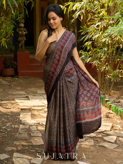 Black Hand Block Printed Ajrakh Modal Saree with Zigzag Pattern and Ornate Border