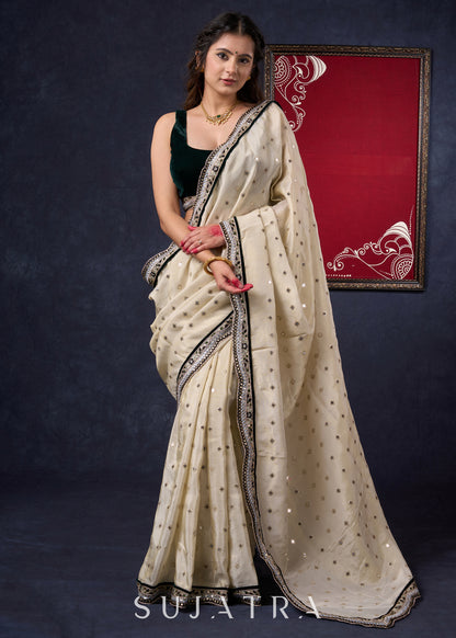 Classy Tissue saree with all-over work Highlighted with Beautiful border
