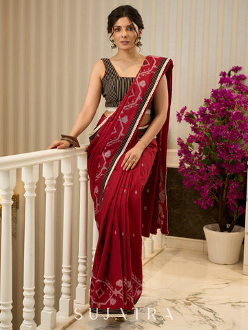 Exquisite Jamdani saree in regal red with intricate motifs and lace borders