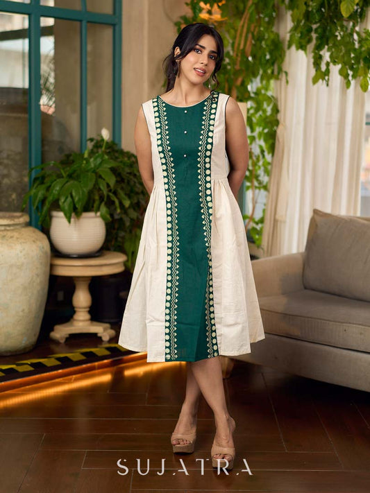 Bottle green and off-white hand block printed sleeveless dress with a block printed geometric panel, pearl embellishments, and refined accents for a contemporary artisanal look.