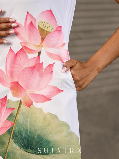 Graceful White lotus printed dress with elegant olive accents.