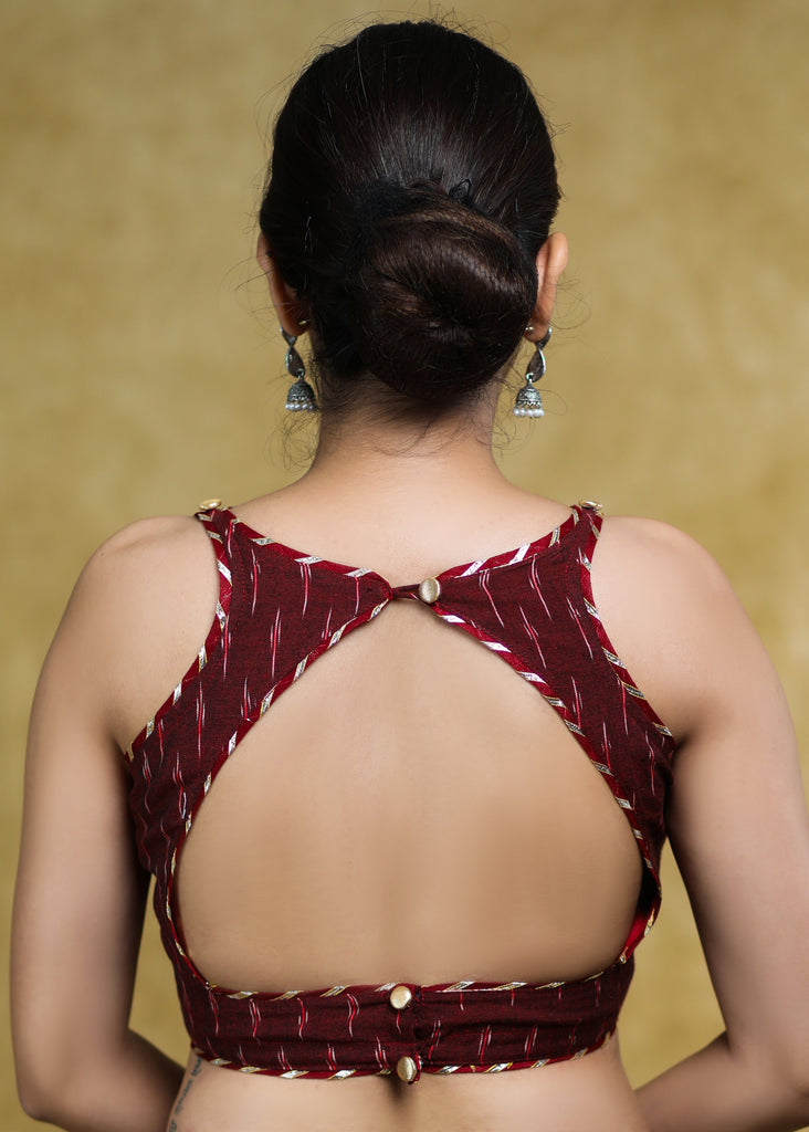 Elegant Maroon Ikaat Sleeveless Blouse with Golden Gota-Patti Detailing & Smart Back