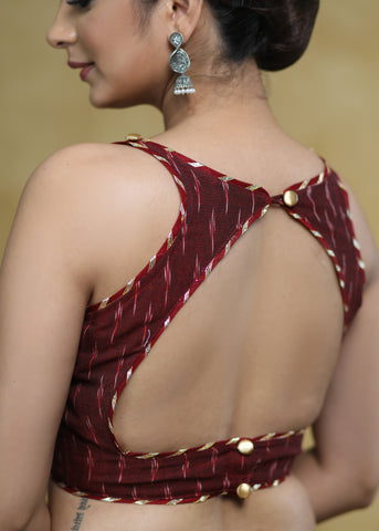 Elegant Maroon Ikaat Sleeveless Blouse with Golden Gota-Patti Detailing & Smart Back