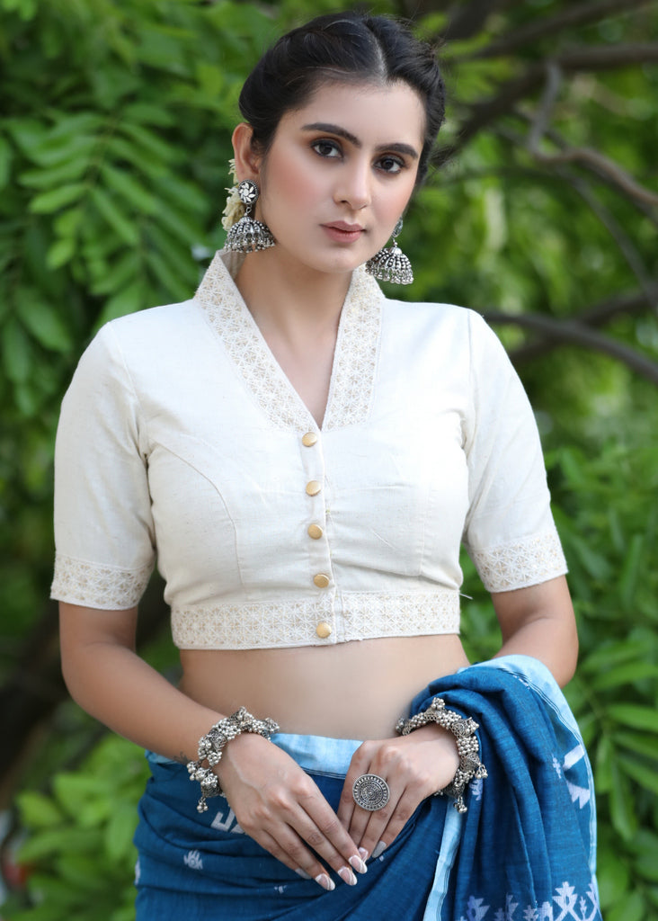 Smart Cream Cotton Collared Blouse Highlighted with Beautiful Lace Detailing and Golden Buttons