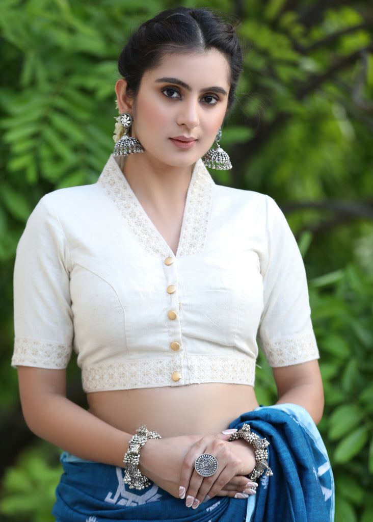 Smart Cream Cotton Collared Blouse Highlighted with Beautiful Lace Detailing and Golden Buttons