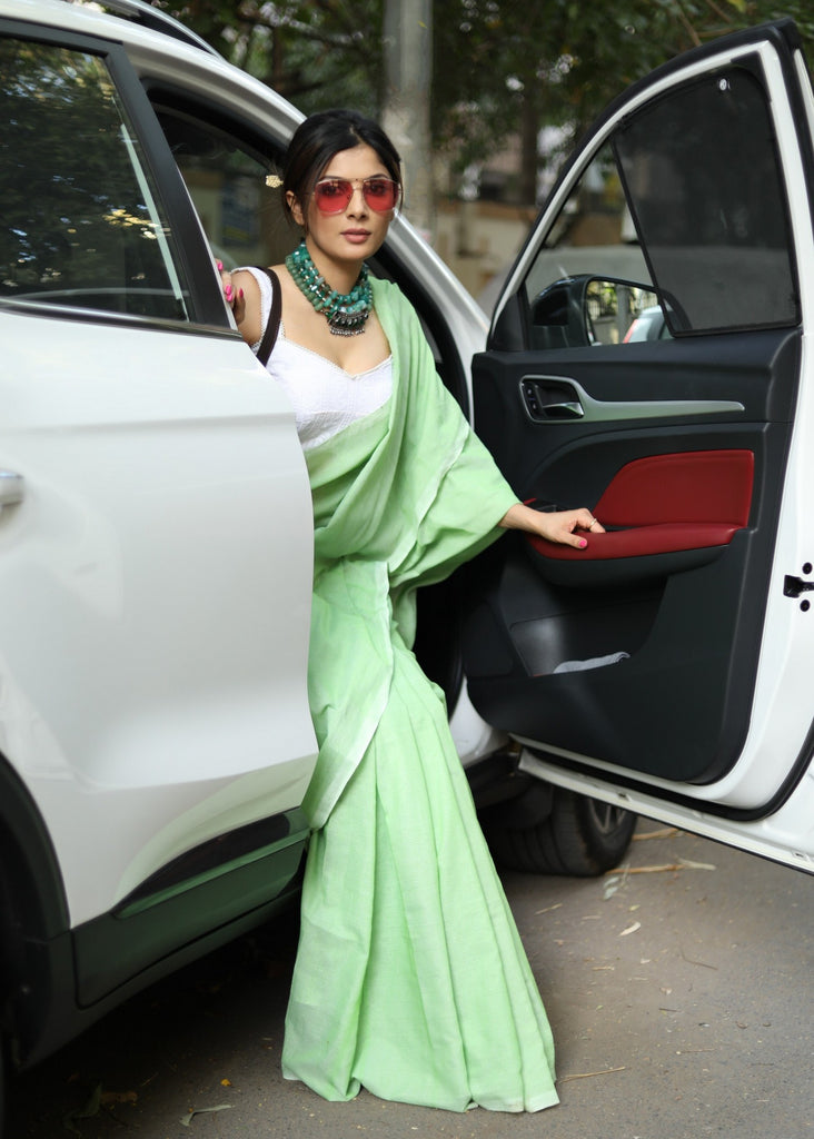 Breathable pista green plain Cotton saree with Chikankari blouse