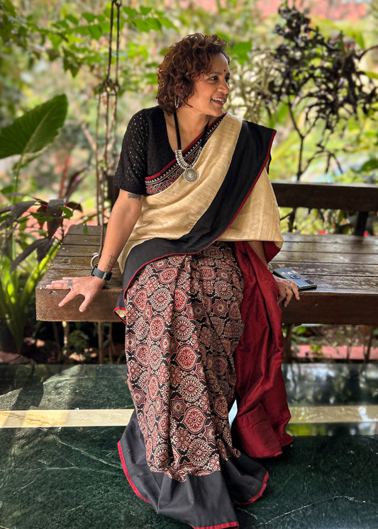 Combination of block printed cotton Ajrakh pleats & pure tassar silk saree with Ajrakh border