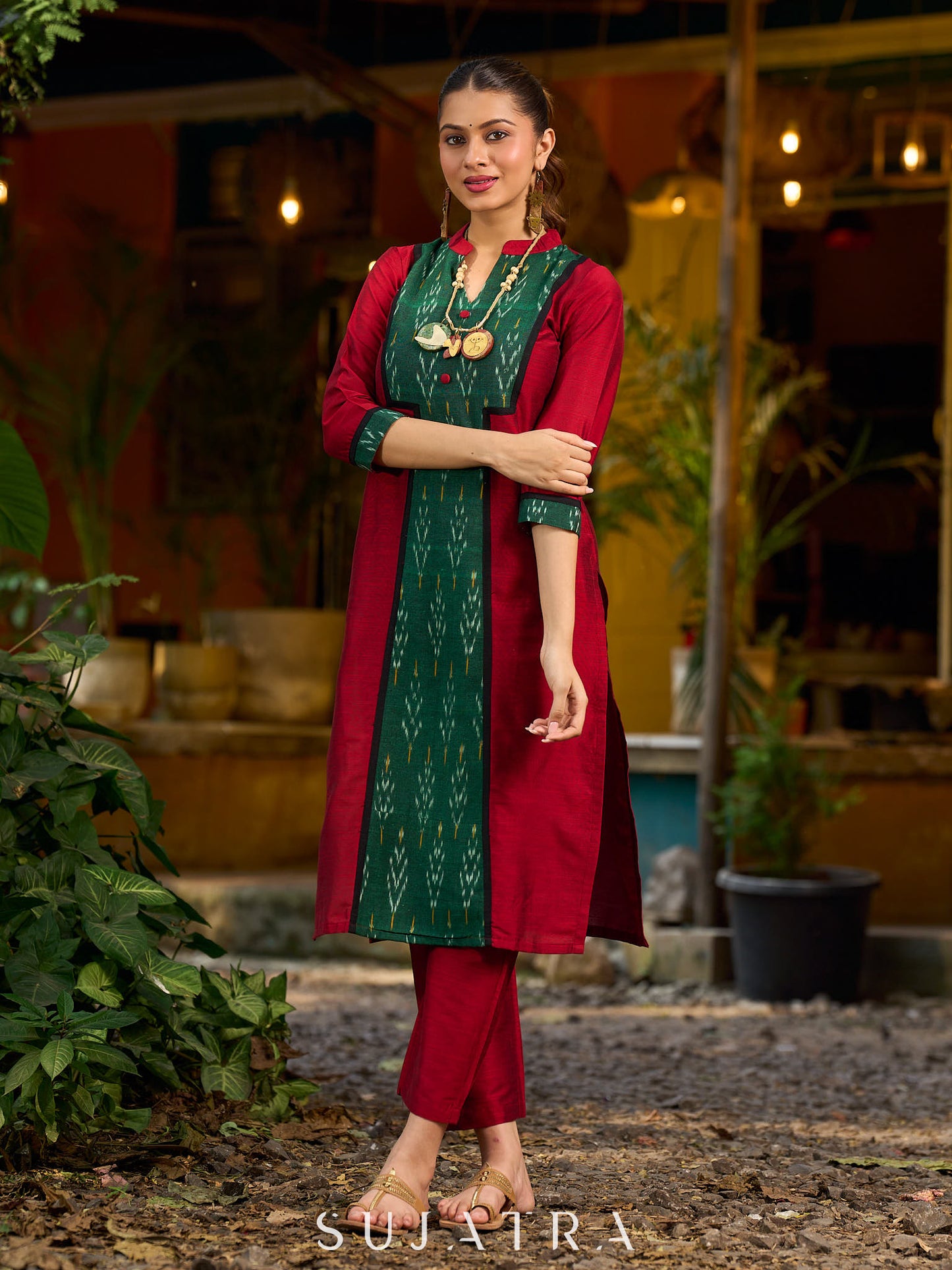 Elegant maroon cotton-silk kurta featuring a green Ikat patch and stand collar.