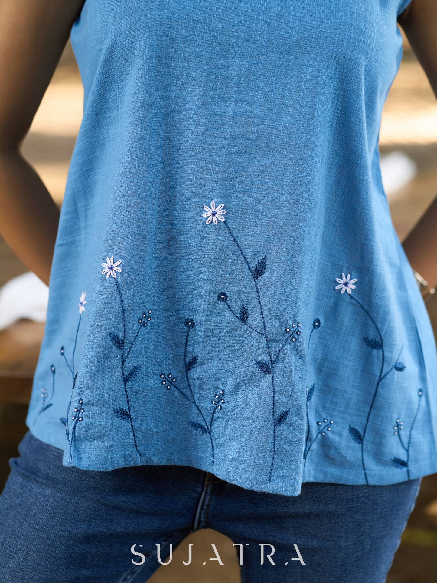 Serene Sky Blue Cotton Slub Sleeveless Top with Hand Embroidered Florals & Intricate Bead Embellishments