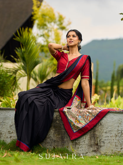 Striking Black Modal Saree with Hand-Painted Madhubani Pallu & Maroon-Blue Border