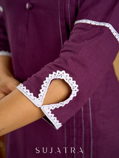Elegant purple cotton top beautifully finished with delicate lace detailing